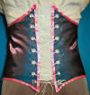 blue and pink shimmer cincher, pink trim, front view, reversible.